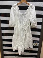 Women "Love Whit" white long sleeves wrap around dress. Size Med. Prev. Owned