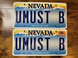 Pair Of Nevada Vanity Personalized License Plate. UMUST B (You Must Be)