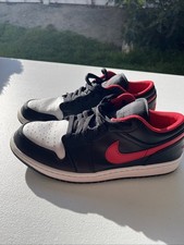 Nike Air Jordan 1 Low in a black, white, and red colorway