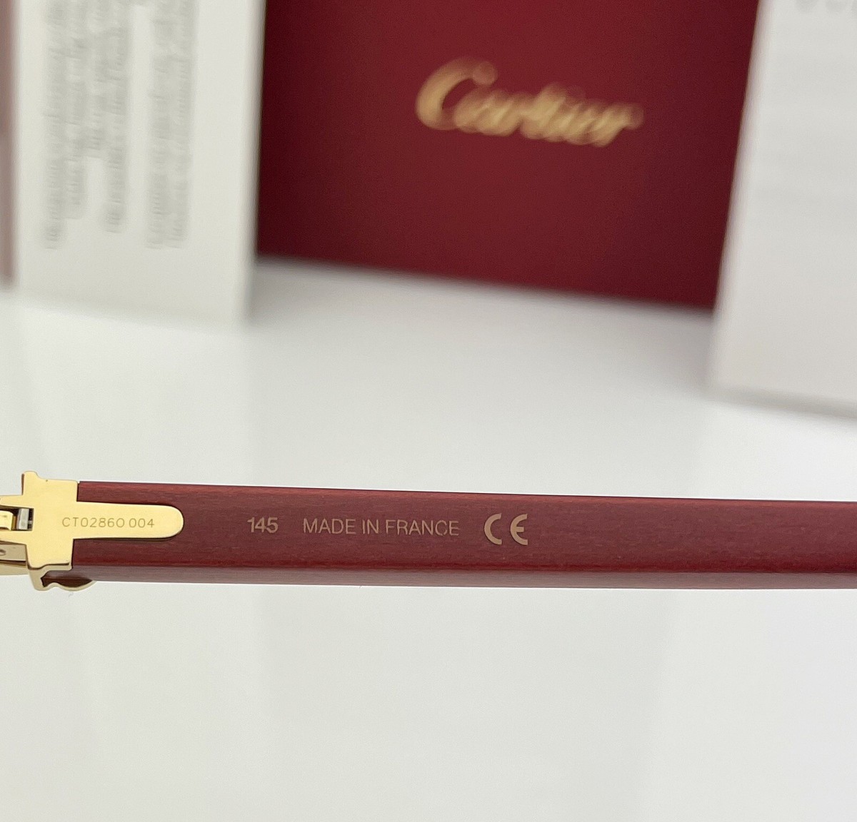 Cartier Rimless Eyeglasses CT0286O 004 Burgundy Wood Yellow