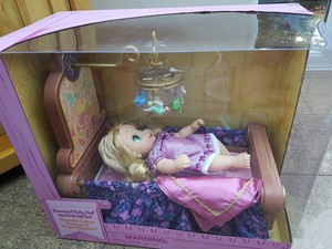 rapunzel baby doll disney store