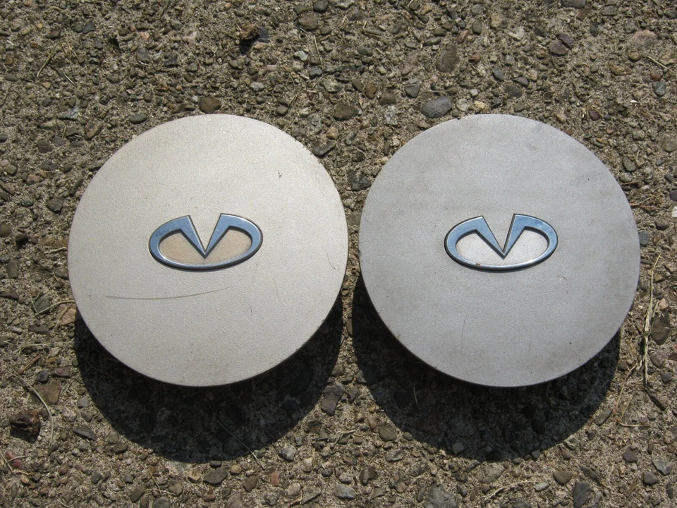 Заводские оригинальные центральные колпаки колес из сплава для Infiniti M30 1990–1992 годов выпуска - Изображение 2 из 4