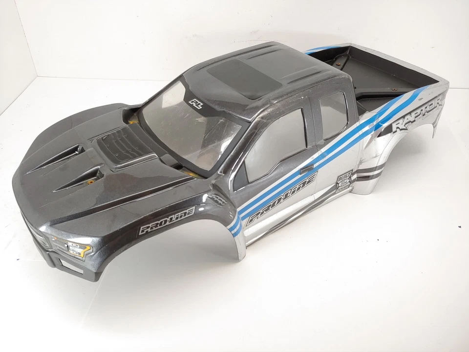 CRACKS: Silver/Gray Proline Ford Raptor Painted Body for Traxxas X-Maxx - Image 3 of 4