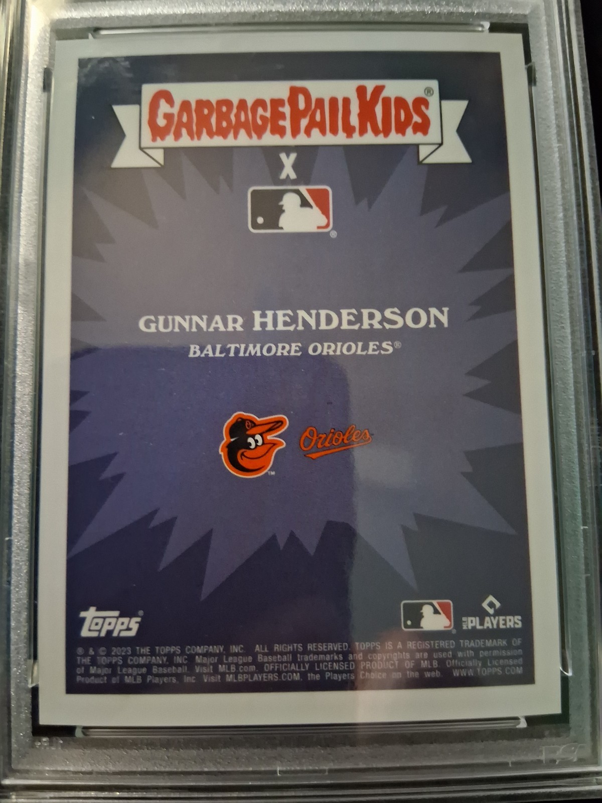 2023 Topps GPK Baseball #25a Gung Ho Gunnar Henderson Stiching Foil R/C PSA 7 view 2