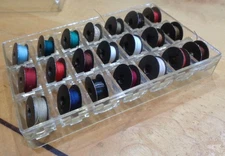 Lot of 104 Metal Bobbins, Brother? Singer? w/plastic cases