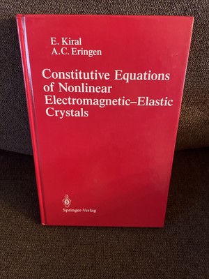 Constitutive Equations of Nonlinear Electromagnetic-Elastic Crystals E. Kiral HC