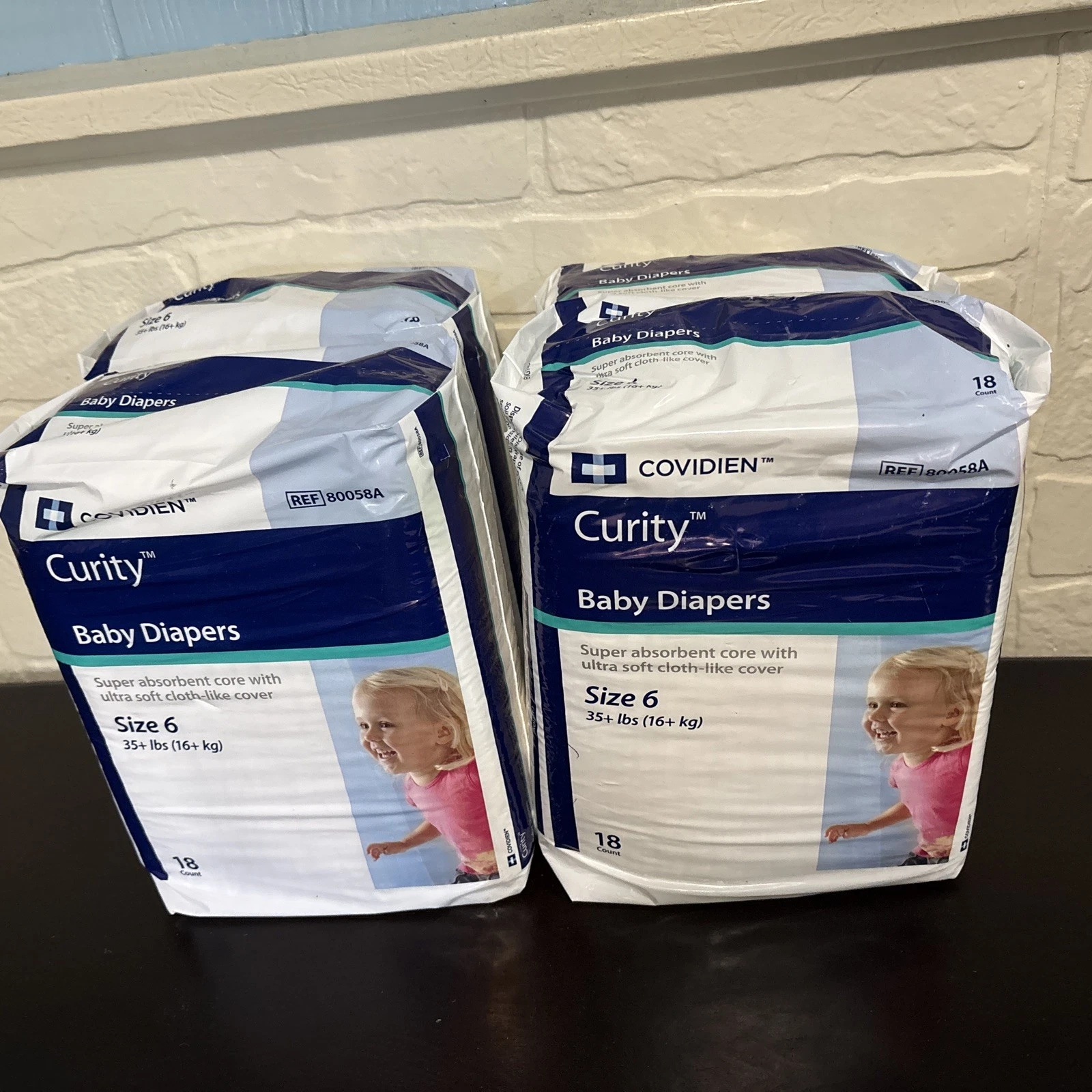 CURITY Baby Diapers-Size 6: XX-Large Weight 35 + lb - 4 Packs of 18