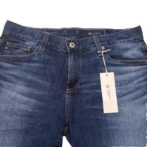 Neu mit Etikett Ag Adriano Goldschmied Nikki Relaxed Skinny Short Mid Rise roher Saum Gr. 28