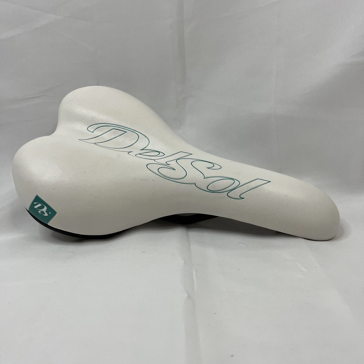 teal and white beach cruiser