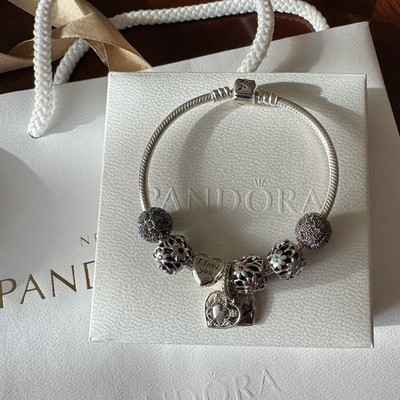 Pandora bracelet with 7 charms