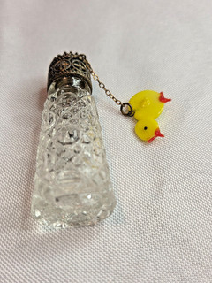 Vintage Czech Irice perfume bottle with red jeweled top & duck charm