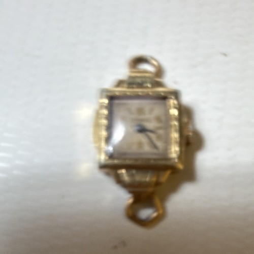 Vintage Gold-Tone Metal Wristwatch with Arabic Numerals for Parts