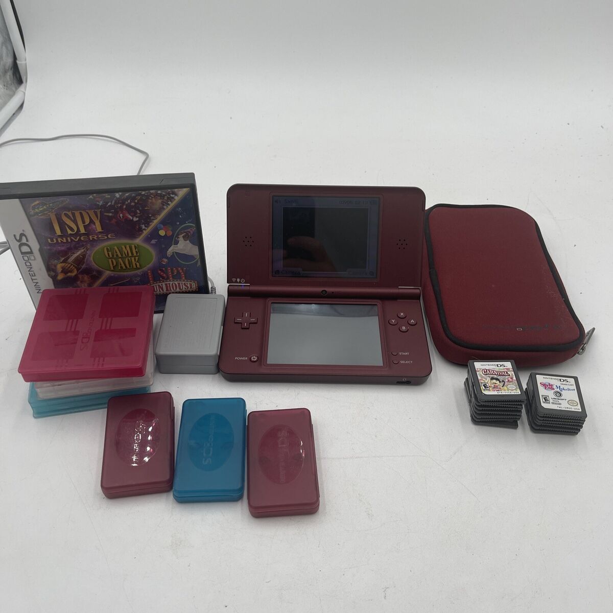 Nintendo DSI XL Console, charger (7) Game Bundle - video gaming