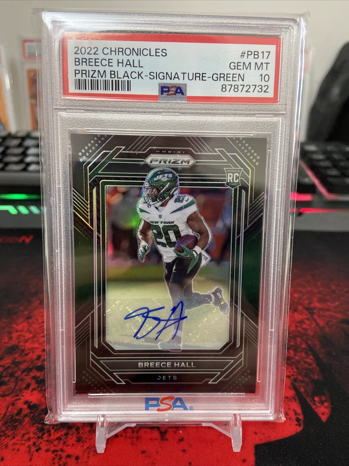 2022 Panini Chronicles Football Breece Hall Prizm Black Green Auto /49 PSA 10