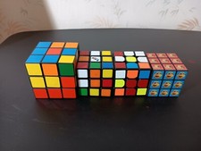 3 Various Sizes Rubik's Cubes, 1 Emoji Cube
