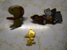 3 Peanuts Jewelry Pieces  2 Snoopy Pins  a Tweety Charm