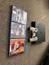 Sony PlayStation 4 Original With Multiple Controllers And Games and headphones 
