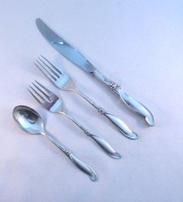 SILVER MELODY-INTERNATIONAL 4 PIECE STERLING LUNCH PLACE SETTING(S)