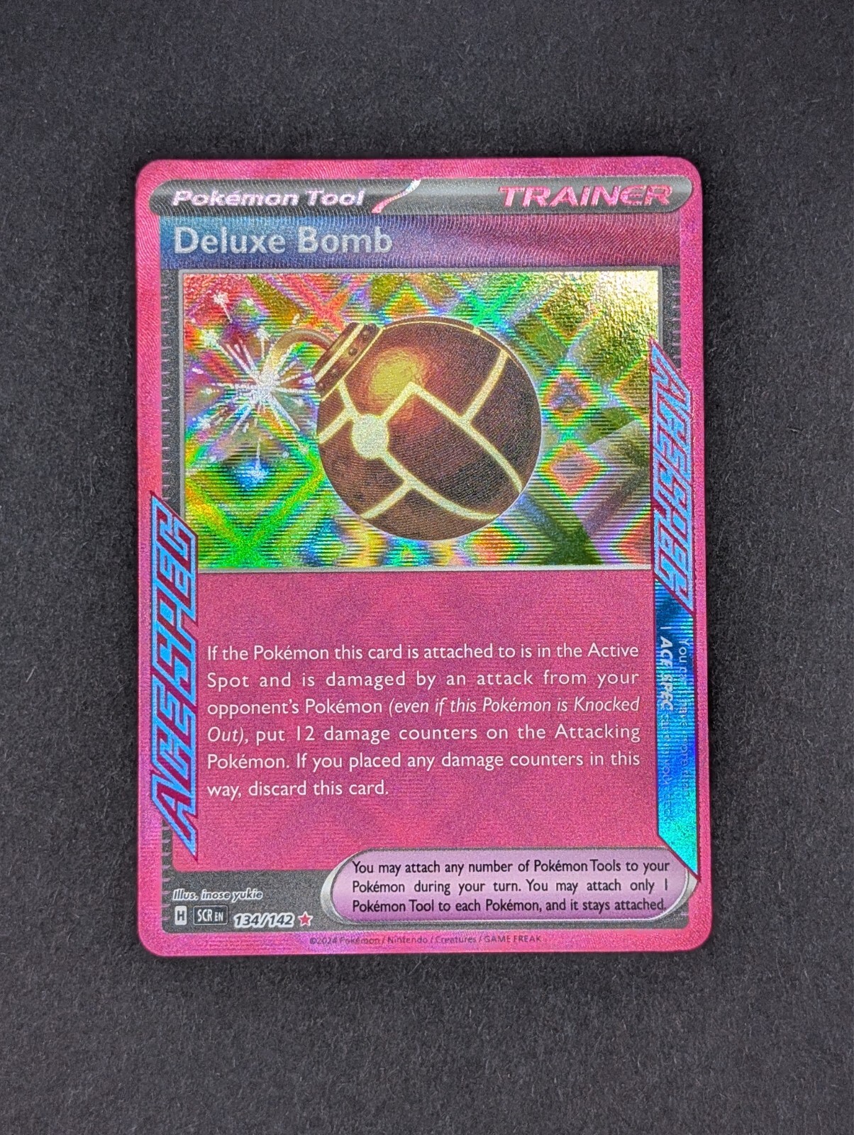 2024 Deluxe Bomb 134/142 ACE SPEC Pokemon TCG Stellar Crown Near Mint Condition Collectible Card