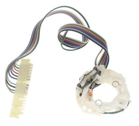 GM Genuine Parts D6262D turn signal switch with multicolor wires and rectangular connector end on white plastic base.