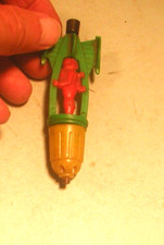 Vintage Cap Bomb Spaceman in Green and Yellow  Spaceship
