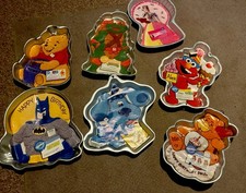 Lote de sartenes para pasteles Wilton de colección Batman TMNT Barbie Elmo Blues Pistas Pooh Cuidado Oso NUEVO 7