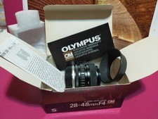 🐉OLYMPUS OM Zuiko 28÷48mm F:4 lens, caps, hood, box, filter, collection item!🐲