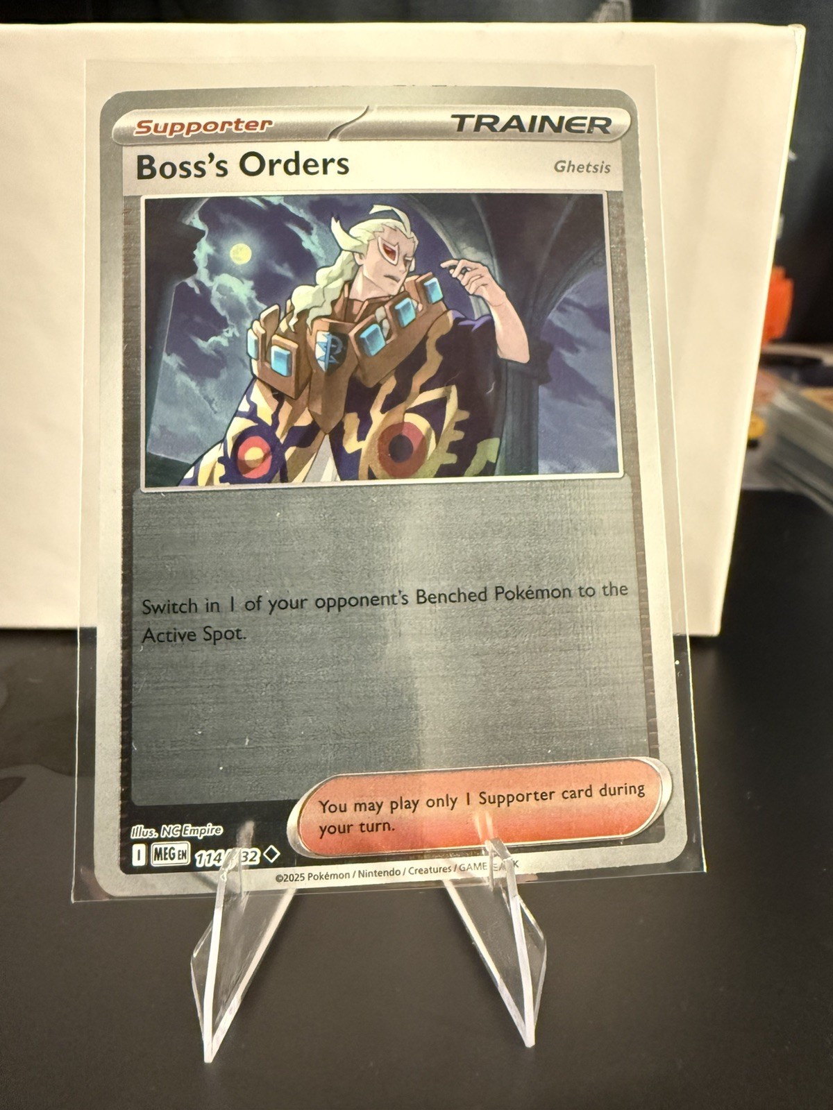 Boss's Orders [Ghetsis] 114/132 Reverse Holo ME01: Mega Evolution