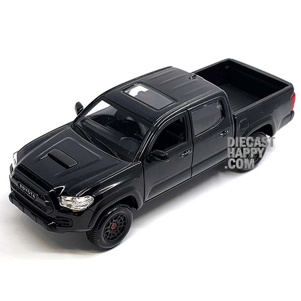 ミニカー Maisto 1/27 TACOMA Hilux Amazon.com: Maisto 1/27 Toyota Tacoma White Finished Product