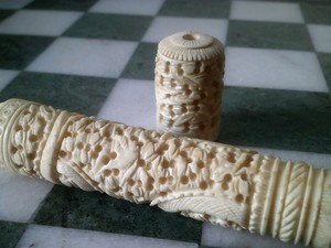 A large 19thC Chinese Canton dragon needle case with needles