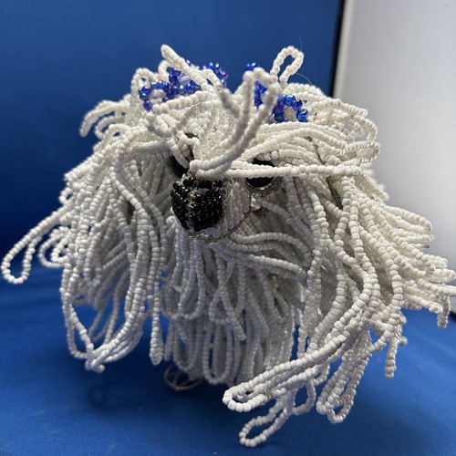 Beaded land: Long-haired Shih Tzu