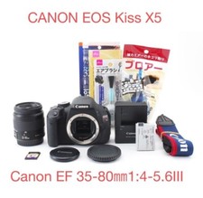 Canon EOS Kiss X5 DSLR Camera  35-80  Lens Kit Body Color Black Used 4598MT