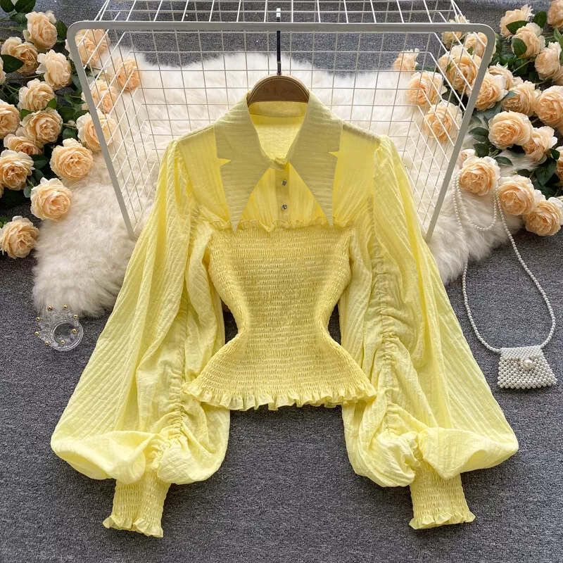 Ladies black hot sale frilly blouse