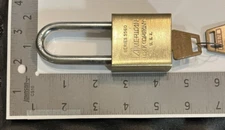 AMERICAN LOCK SERIES 5560 BRASS BODY, HARDENED STEEL SHACKLE, (2) BRASS KEYS.