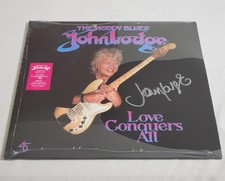 John Lodge Autographed Love Conquers All Violet Vinyl EP (Of The Moody Blues)