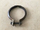 Muffler pipe connector clamp