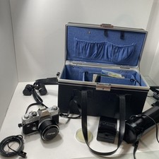 Canon FTb ql 35mm Camera with 2 Lens, Filters, Case, and accessories untested