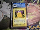 Vintage 1999 Pokémon Base Set Shadowless Pikachu  Red Cheeks CGC 7.5 with Subs