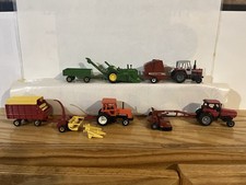 Trattori e attrezzi 1/64