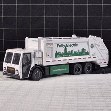 Camión de basura Greenlight 1:64 DSNY Mack LR cargador trasero eléctrico 13620