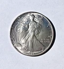 1986  .999 FINE SILVER WALKING LIBERTY DOLLAR UNCIRCULATED COIN