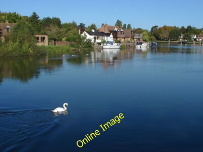 Photo 6x4 Blue water, white swan Staines A swan in progress up the Thames c2012