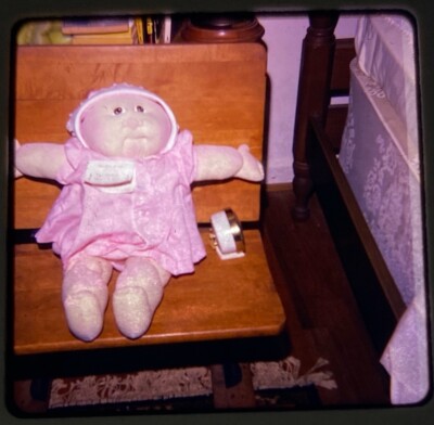 1970s Girl Cabbage Patch Doll Retro Toy Pink Dress Sitting 1979 Slide