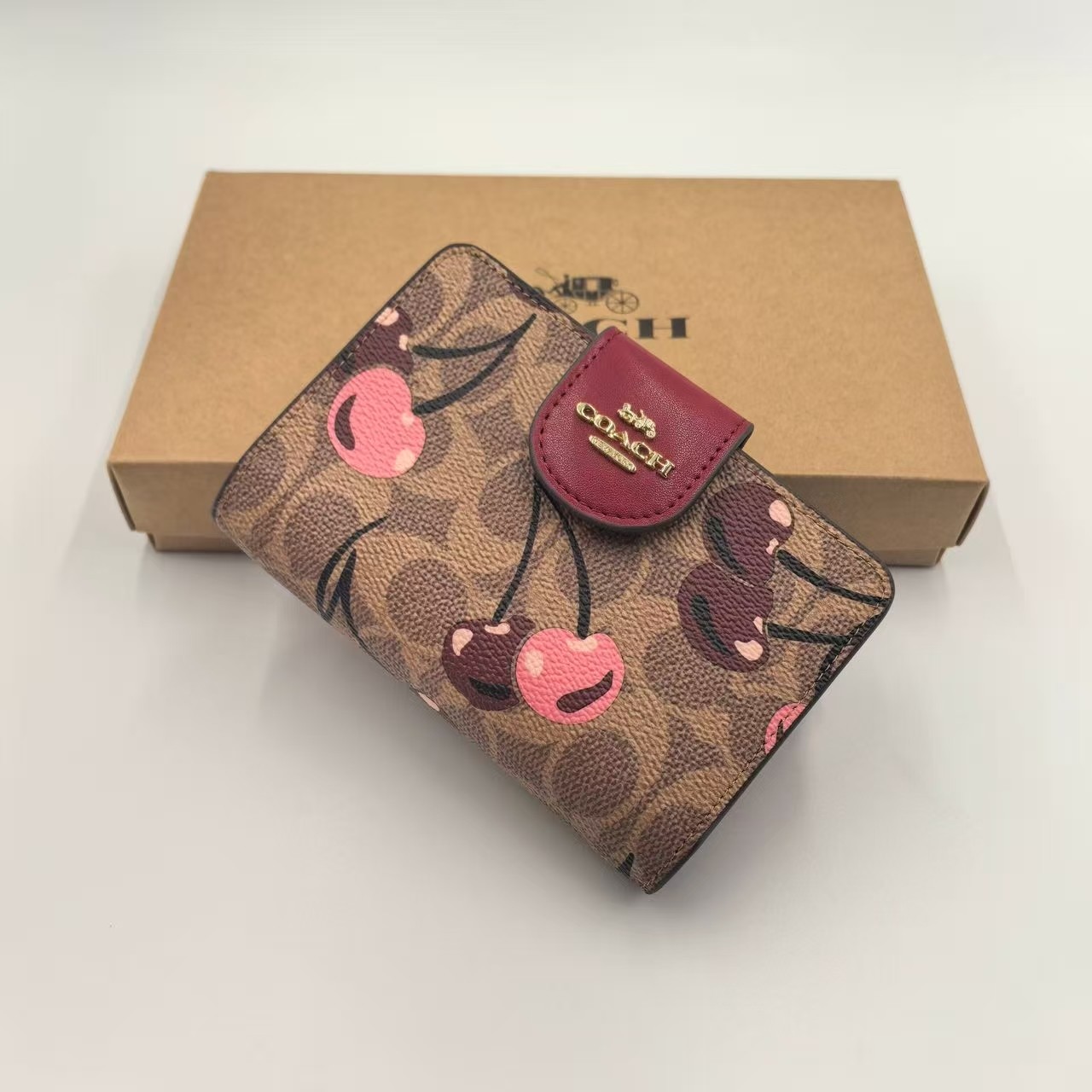 COACH Bi-fold Wallet Cherry Print in Signature Brown Outlet