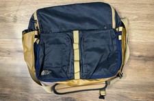 The North Face navy blue and tan shoulder bag