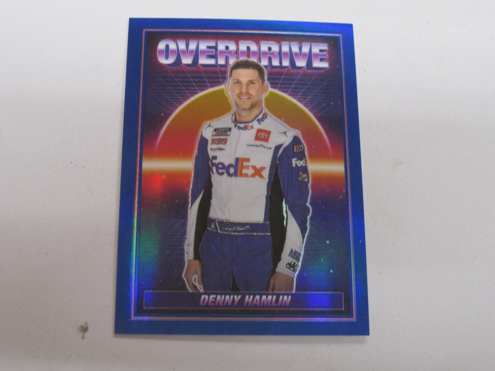 Denny Hamlin 2023 Panini Chronicles Nascar Luminance Overdrive Blue Prizm /199
