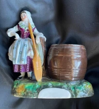 19TH CENTURY STONEWARE PORCELAIN FIGURAL CHEESMAKER MATCH HOLDER