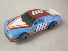 Vintage 1990 Tomy LIFE-LIKE NASCAR #00 Oldsmobile Slot Car