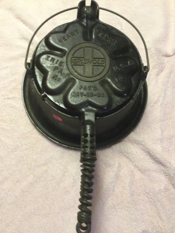 ANTIQUE GRISWOLD HEART AND STAR WAFFLE IRON AND STAND