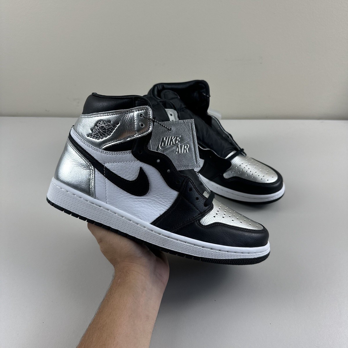 air jordan 1 retro high og black metallic silver